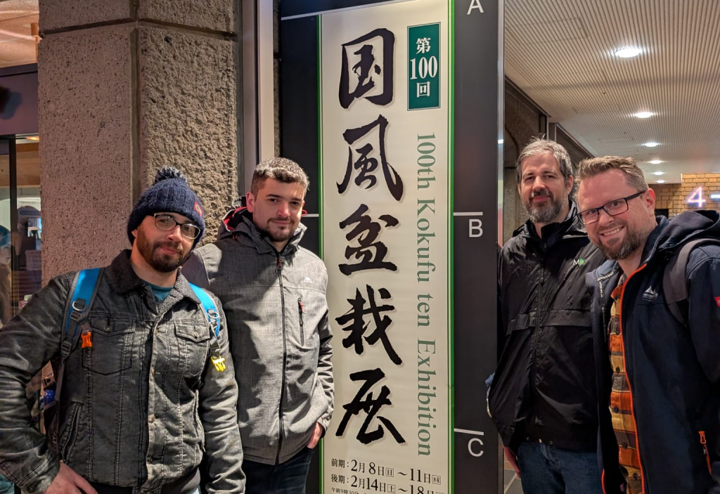 RBS members outside 100th Kokufu Ten bonsai exhibition with Kokufu banner, Japan Feb 2026
