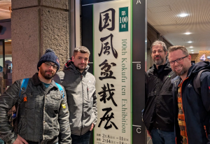 RBS members outside 100th Kokufu Ten bonsai exhibition with Kokufu banner, Japan Feb 2026